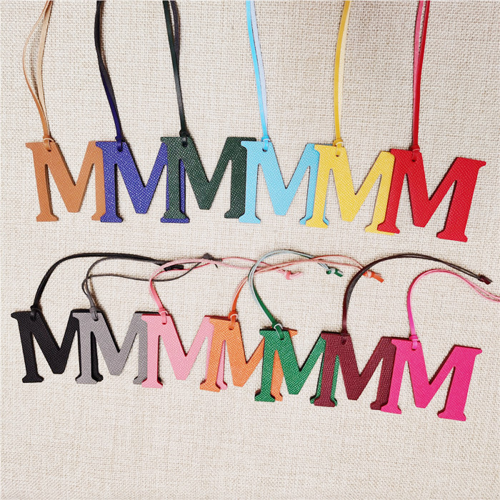 English Letter M Alphabet Cowh - Women Accessories Name In English recension och pris